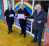 Inverclyde HSCP Telecare silver accreditation. Pictured, from left, are Lesley Deane, integrated technology enabled care coordinator, Councillor Robert Moran, and Tommy Arthur, telecare manager.
